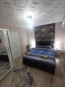 Postel nebo postele na pokoji v ubytování DJERDAN