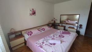 Postel nebo postele na pokoji v ubytování Apartman CELIJA