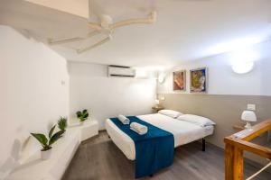 Postel nebo postele na pokoji v ubytování Apartamentos Turísticos Centro Histórico, by CartagenaSpain