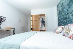 Postel nebo postele na pokoji v ubytování Canteras Beach Crush