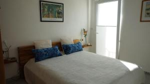 Łóżko lub łóżka w pokoju w obiekcie Apartment Torrecilla