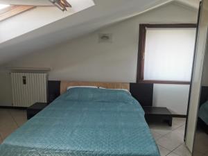 Postel nebo postele na pokoji v ubytování Serenity Home