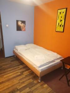Postel nebo postele na pokoji v ubytování Hotel Praha Club bed & breakfast