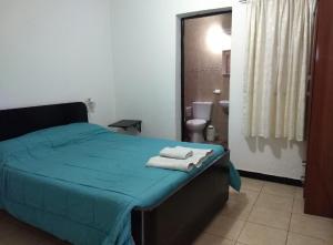 Posteľ alebo postele v izbe v ubytovaní Tierra de Huarpes