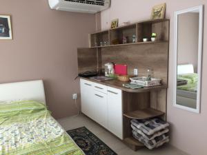 Kuchyňa alebo kuchynka v ubytovaní Anna apartman
