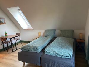 Postel nebo postele na pokoji v ubytování Gamle Præstegård + 1 fotografie