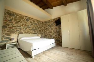Säng eller sängar i ett rum på Casa vacanze Raggio di Sole