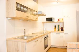 Kuchyň nebo kuchyňský kout v ubytování Ferienwohnung Hilber