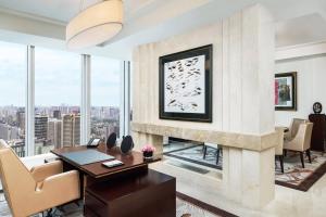 a rendering of a living room with a fireplace at The St. Regis Chengdu in Chengdu