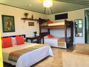 Postel nebo postele na pokoji v ubytování Mamatina Hotel