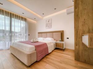 Postel nebo postele na pokoji v ubytování B&B Lovac Hasa 2