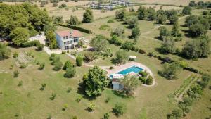 an aerial view of a house with a swimming pool at Olivos Villa Sani in Sani Beach