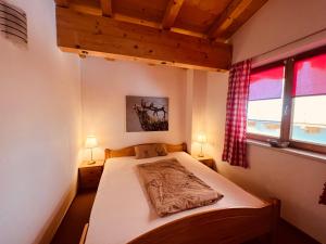 Postel nebo postele na pokoji v ubytování Ferienhaus Zillertal Panorama Blick Balkon Sauna