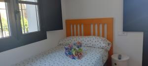 Postel nebo postele na pokoji v ubytování Apartamento Corazón de Liébana