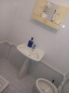 a bathroom with a sink and a toilet at Old House On The Beach Asprovalta 1 in Asprovalta