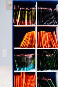 a refrigerator filled with lots of different types of food at Cris Hotel in Florianópolis