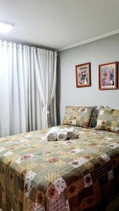 Voodi või voodid majutusasutuse Quarto Jaraguá/São Luís toas