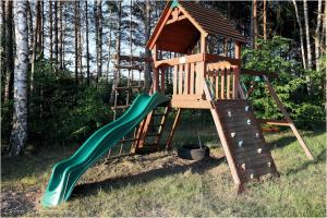 Ο χώρος παιχνιδιού για παιδιά στο Apartament w Villa Konik Mazury