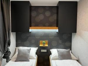 Llit o llits en una habitació de Premium mobile home Eden