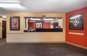 a lobby of a hospital with a large mirror at Suburban Studios in Oklahoma City