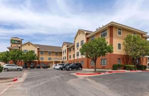 a hotel with cars parked in a parking lot at Extended Stay America Suites - Amarillo - West in Amarillo