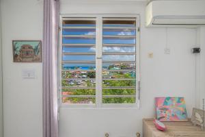 Les Trois-Îlets şehrindeki T2 PITAYA, Trois-îlets vue mer tesisine ait fotoğraf galerisinden bir görsel