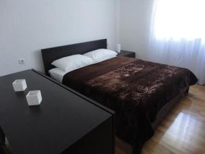 Ліжко або ліжка в номері Apartment Mira