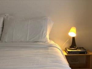 Letto o letti in una camera di Best location ! Apt privado 2 hab con AC Completamente equipado en Asuncion