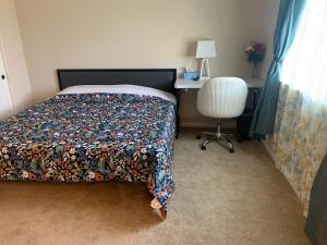 Voodi või voodid majutusasutuse LuxHome Suites in Mansion toas