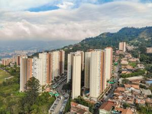 an aerial view of a city with many tall buildings at Apto Sabaneta 2 habitaciones al lado Centro Comercial Mayorca in Sabaneta