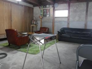 a living room with a table and a couch at Bob's house - Vacation STAY 42876v in Kameoka