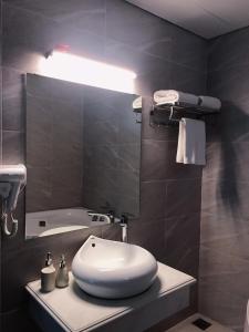Koupelna v ubytování Rosy Hotel Dương Nội