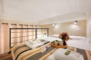 Posteľ alebo postele v izbe v ubytovaní Cosy apartment - 1BR-3P - Arc de Triomphe + 10 fotografií