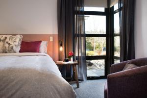 Un ou plusieurs lits dans un hébergement de l'établissement Lake Daylesford Lodge 6