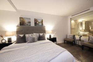 Cama o camas de una habitación en SHH - D1 Tower Apartments