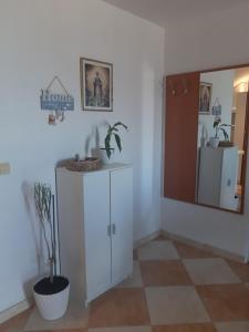 Kuchyň nebo kuchyňský kout v ubytování Apartments T & D