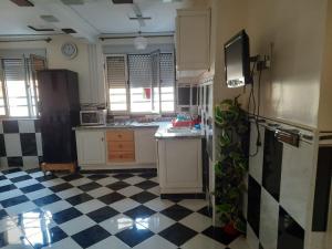 Kuchyň nebo kuchyňský kout v ubytování Appartement SAIDÏA l
