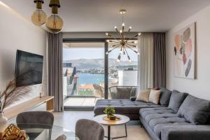 a living room with a couch and a table at Apartment Ladan in Trogir