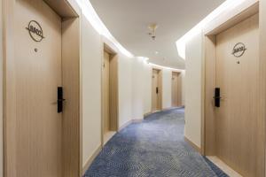 Зображення з фотогалереї помешкання Xinhuating Business Hotel у місті Lishui
