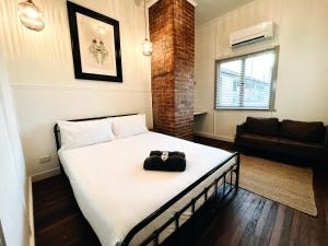 Ein Bett oder Betten in einem Zimmer der Unterkunft The Stanley Hotel Kilcoy