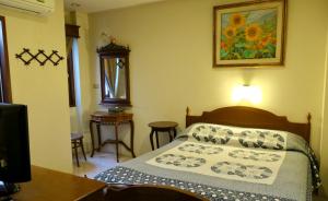 Postel nebo postele na pokoji v ubytování Fulay Hotel