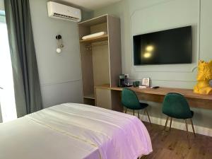 Krysos Luxury Rooms客房内的一张或多张床位