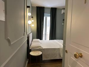 Krysos Luxury Rooms客房内的一张或多张床位