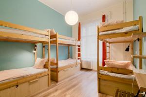 Palanda nebo palandy na pokoji v ubytování GoodMo Budapest Smart Rooms