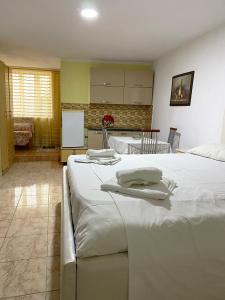 Katil atau katil-katil dalam bilik di Hotel Odhisea Qeparo