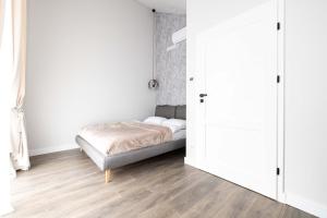 Katil atau katil-katil dalam bilik di Birch Haven Apt W/Terrace By Cohost