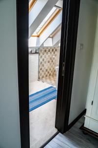 a view of a bathroom through a door at Casa Românească in Putna