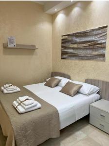 Ένα ή περισσότερα κρεβάτια σε δωμάτιο στο B&B ReLu' +32 φωτογραφίες