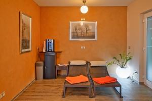 Posezení v ubytování Hotel Im Schützenhof, Jever