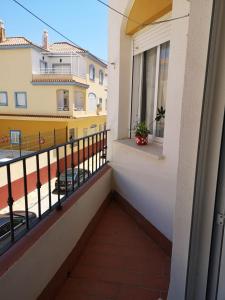 a balcony of a building with a view of a street at Apartamento Aretusa Luz in Zahara de los Atunes